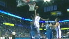 Durant elevates and hammers a slam over defenders