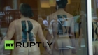 UK: Naked protesters rally against expensive drugs at pharma company's London HQ