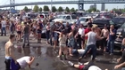 Parking lot concert fight with cheap kicks to the face