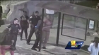 Baltimore police officer caught on video beating suspect