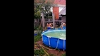 Guy Tries to Swing into Pool