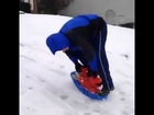 Helfer Snowboarding on a Elmo see-saw.