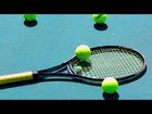Slow Motion Wilson Tennis Balls Bounce Hitting Racket Racquet on Hard Court Surface in HD Video View