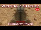 Writing At The Bottom Of A Statue? Littered With Anomalies!