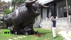 China: Xiamen's answer to the Wall Street Bull? Residents pray for market upturn