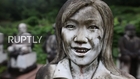 Japan: Stone cold stares! 800 lifelike statues captured by drone footage