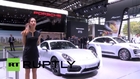 France: Ooh La La! Racy girls tout flashy cars at Paris Motor Show