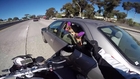 Motorcyclist Grabs Feet on the Freeway
