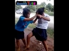 A couple of crazed Thai school girls fight like wild cats in the mud