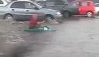Use a kayak to go to work... Flooded streets!