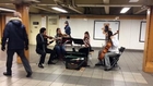 Classical music and ballet dancers performing in NYC subway